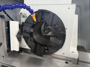 Industrial horizontal CNC lathe featuring a reinforced bed and specialized steady rest for high-torque milling of long-axis pump rotors.