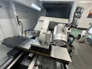 Close-up of the heavy-duty milling head and powerful motor assembly on the PH80 series Rotor Whirling Machine, engineered for high-torque metal cutting.